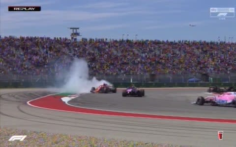 Sebastian Vettel facing the wrong way after a collision - Credit: SKY SPORTS F1