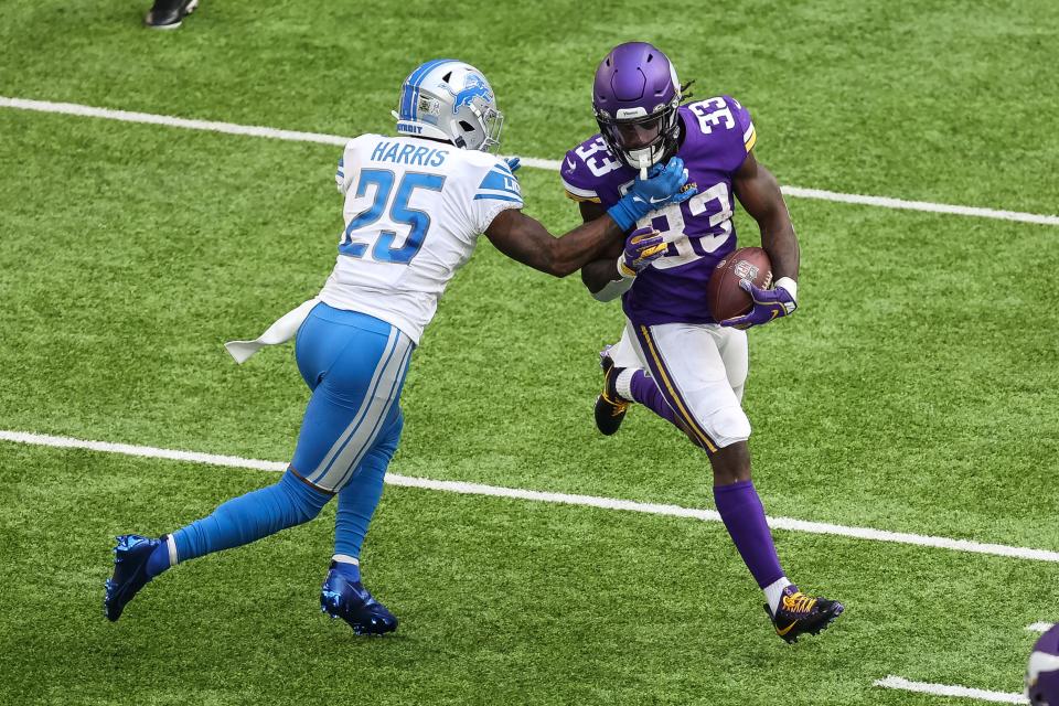 Minnesota Vikings running back Dalvin Cook runs the ball against Detroit Lions safety Will Harris during the second quarter at U.S. Bank Stadium, Nov. 8, 2020.