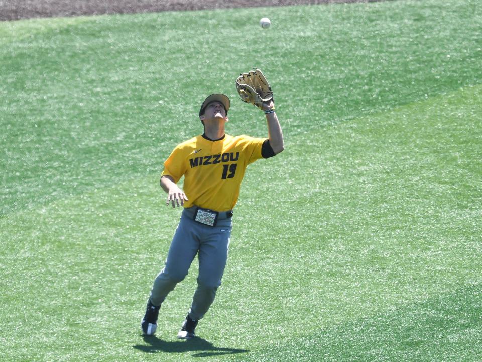 Missouri infielder Trevor Austin catches a fly ball during the NCAA baseball game against Tennessee on Sunday, April 10, 2022 in Knoxville, Tenn. 