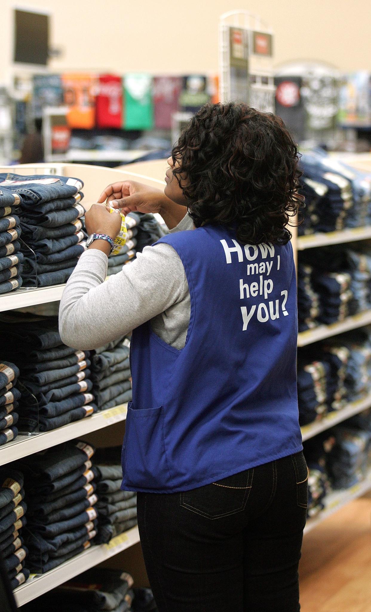 Walmart employees may soon be able to wear jeans to work. (Photo by Tim Boyle/Getty Images)