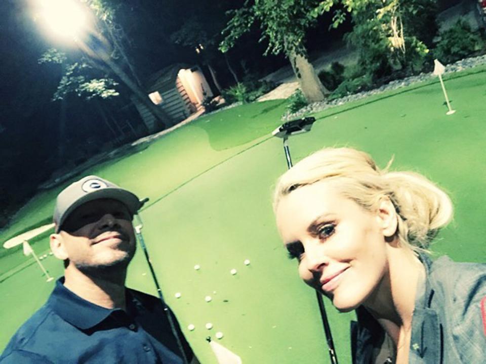 <a href="https://people.com/home/jenny-mccarthy-donnie-wahlberg-house-tour-chicago-st-charles/" rel="nofollow noopener" target="_blank" data-ylk="slk:Backyard date nights;elm:context_link;itc:0;sec:content-canvas" class="link ">Backyard date nights</a> for McCarthy and Wahlberg include mini-golf (see more of their <a href="https://people.com/home/jenny-mccarthy-donnie-wahlberg-house-tour-chicago-st-charles/" rel="nofollow noopener" target="_blank" data-ylk="slk:gorgeous suburban Chicago home here;elm:context_link;itc:0;sec:content-canvas" class="link ">gorgeous suburban Chicago home here</a>).