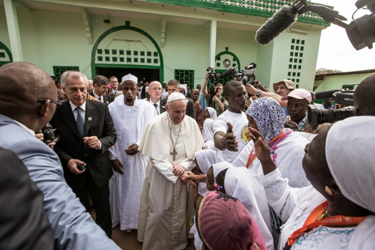 Pope Francis visits a mosque in a flashpoint Muslim neighbourhood in Bangui, Central African Republic, where tensions remain high after months of violence