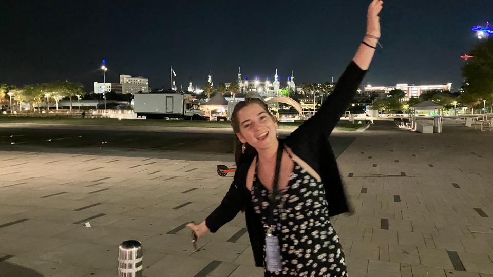 Alexandra Pugliese poses in downtown Tampa with the University of Tampa's famous minarets in the background.