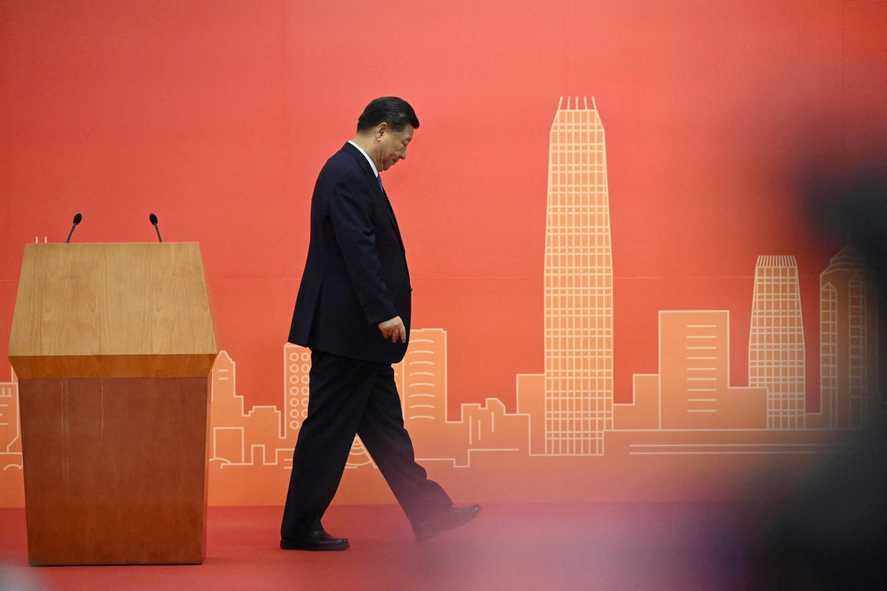 China's President Xi Jinping leaves the podium after speaking upon his arrival via high-speed rail, ahead of the 25th anniversary of the former British colony's handover to Chinese rule, in Hong Kong, China June 30, 2022. Selim Chtayti/Pool via REUTERS