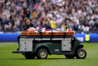 West Ham United's George Earthy leaves the pitch on a stretcher after becoming injured following a clash with team-mate Edson Alvarez during the English Premier League soccer match between West Ham United and Fulham, at the London Stadium, London, Sunday April 14, 2024. (Bradley Collyer/PA via AP)