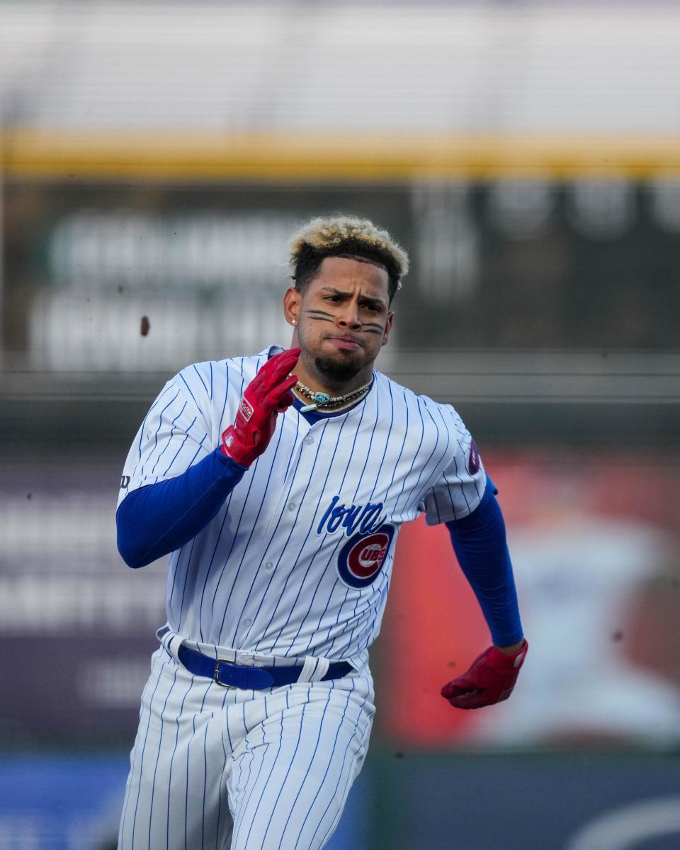 Iowa Cubs right fielder Christopher Morel (12) runs to third base during the season opener at Principal Park in Des Moines on March 31.