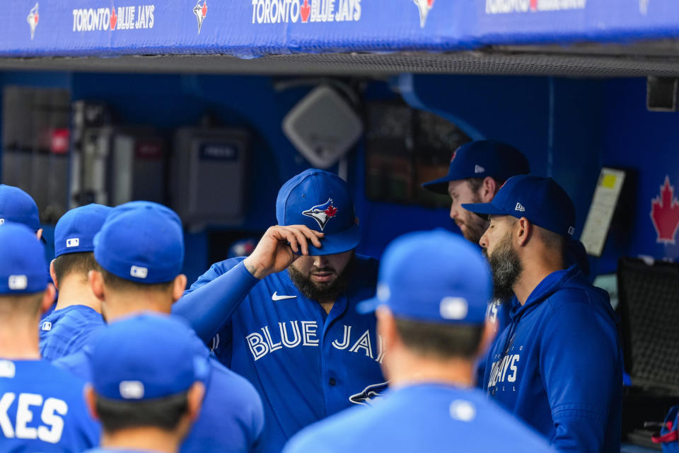 Toronto Blue Jays starting pitcher Alek Manoah (6) walks through the dugout after being pulled against the Houston Astros in first inning of a baseball game, in Toronto, Monday, June 5, 2023. (Andrew Lahodynskyj/The Canadian Press via AP)