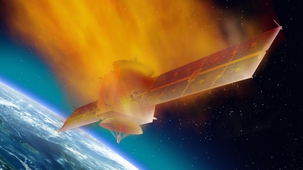  Illustration of a satellite burning up as it reenters Earth's atmosphere. 