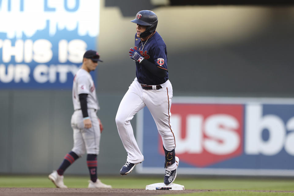 Minnesota Twins' Gio Urshela runs past second base after hitting a home run during the fourth inning of the team's baseball game against the Cleveland Guardians, Saturday, May 14, 2022, in Minneapolis. (AP Photo/Stacy Bengs)