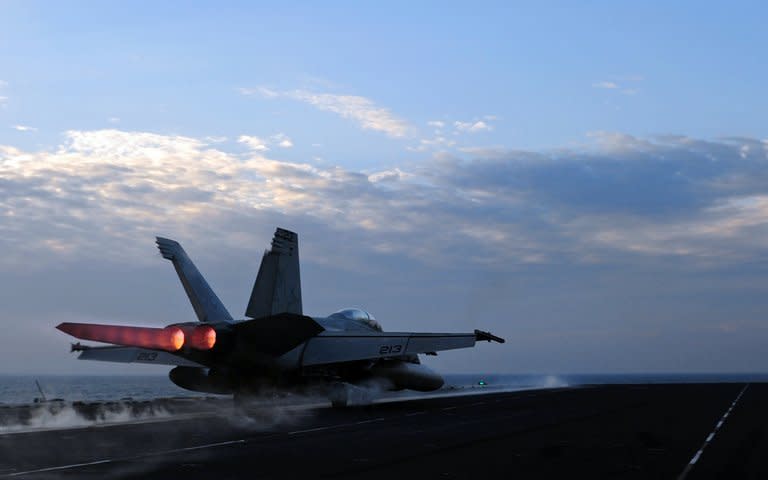 An F/A-18E Super Hornet launches from the flight deck of the Nimitz-class aircraft carrier USS Abraham Lincoln (CVN 72) during operations on February 13, 2012 in the Arabian Gulf