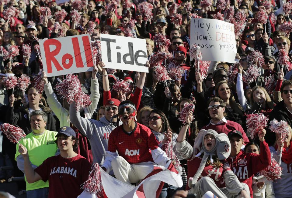 Alabama fans at Bryant-Denny. Wearing costumes and face paint. (AP File Photo)