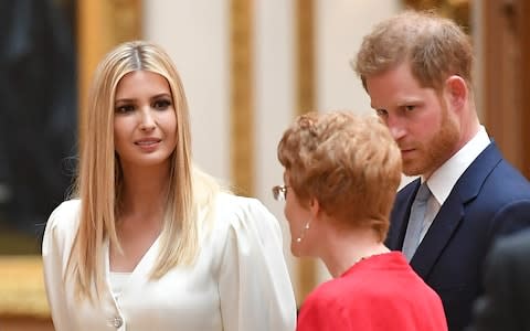 Ivanka Trump and Prince Harry view displays of US items of the Royal Collection at Buckingham Palace  - Credit: Mendel Ngan/AFP