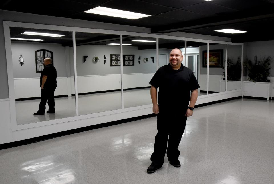 Cilantro Mexican Restaurant owner Miguel Angel stands in his newly renovated banquet room.