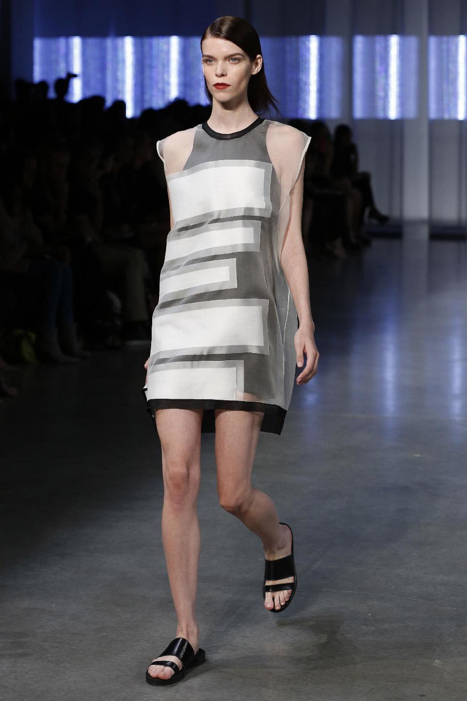 The Helmut Lang Spring 2014 collection is modeled during Fashion Week in New York, Friday, Sept. 6, 2013. (AP Photo/John Minchillo)