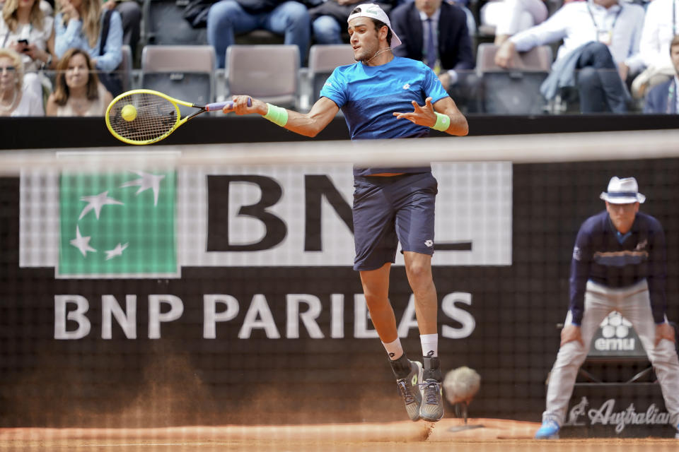 Matteo Berrettini of Italy returns the ball to Alexander Zverev of Germany at the Italian Open tennis tournament, in Rome, Tuesday, May, 14, 2019. (AP Photo/Andrew Medichini)