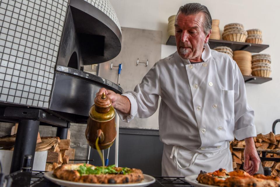 Bivio Pizza Napoletana in Montclair   on Thursday July 25, 2019. Tomasso Colao, co-owner of the restaurant makes a pizza. 