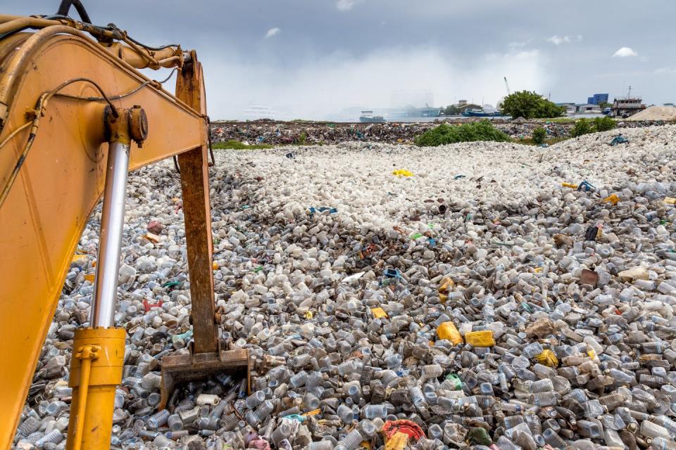 Piles of plastic waste in a landfill