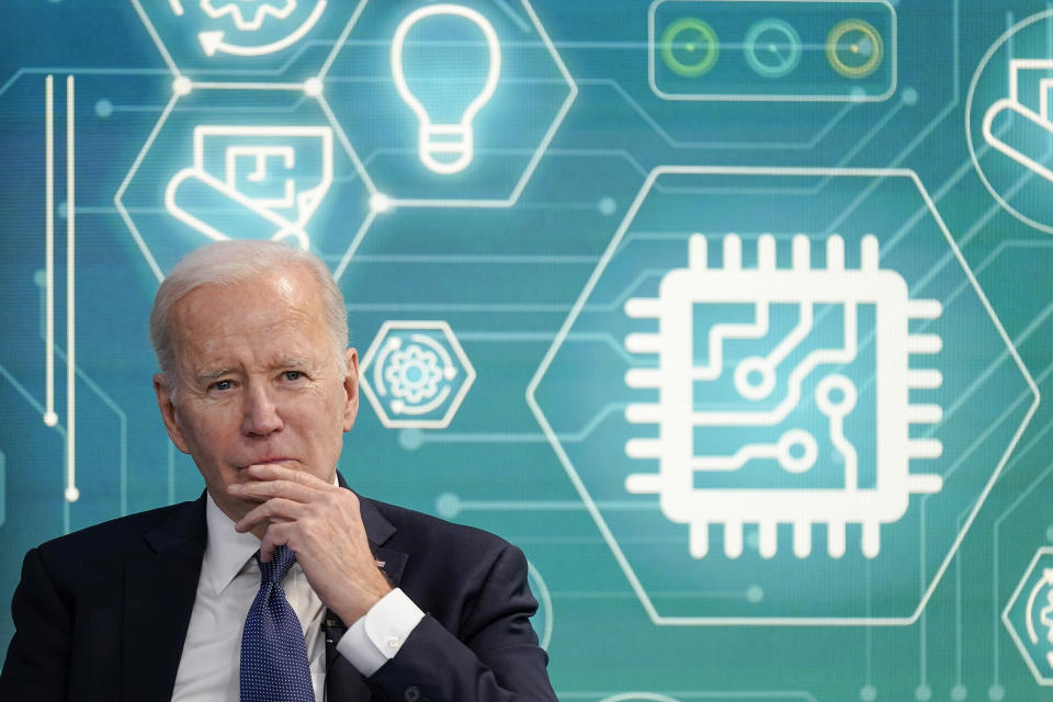 FILE - President Joe Biden attends an event to support legislation that would encourage domestic manufacturing and strengthen supply chains for computer chips in the South Court Auditorium on the White House campus, March 9, 2022, in Washington. Biden is working to create a manufacturing revival, even helping to put factory jobs in Republican territory under the belief it can restore faith in U.S. democracy. (AP Photo/Patrick Semansky, File)