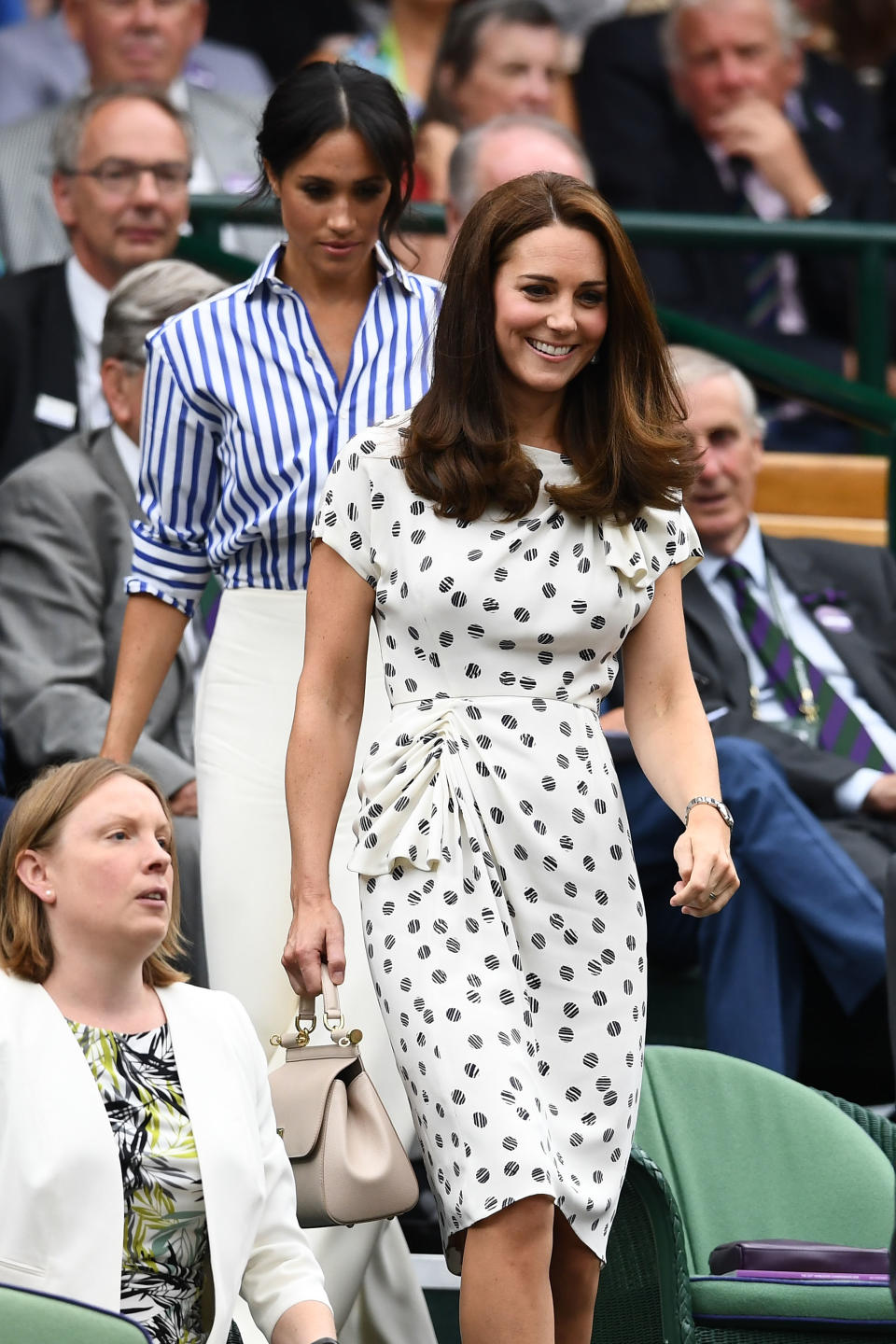 <p>The Duchess of Cambridge joined her new sister-in-law for day 12 of Wimbledon in a Jenny Packham midi dress accessorised with a Dolce and Gabbana handbag. <em>[Photo: Getty]</em> </p>