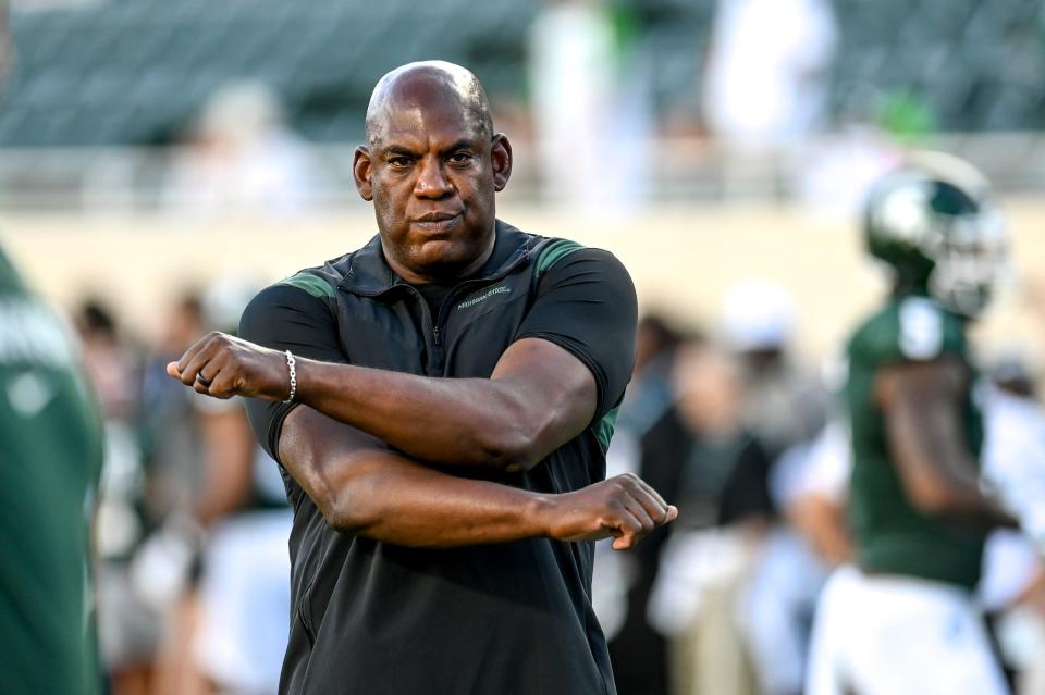 Michigan State's head coach Mel Tucker walks the field before the football game against Central Michigan on Sept. 1 at Spartan Stadium in East Lansing, Mich.