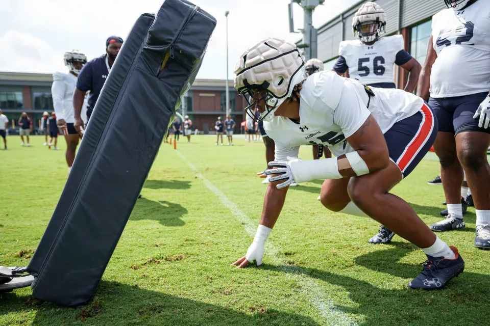 Auburn jack linebacker Keldric Faulk (15) during a practice at the Woltosz Football Performance Center on Aug. 7.