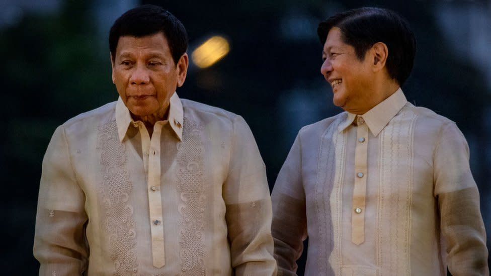 Philippine President Rodrigo Duterte and President-elect Ferdinand "Bongbong" Marcos Jr. poses for pictures during the oathtaking of Sara Duterte as the next Vice President on June 19, 2022 in Davao, Philippines.