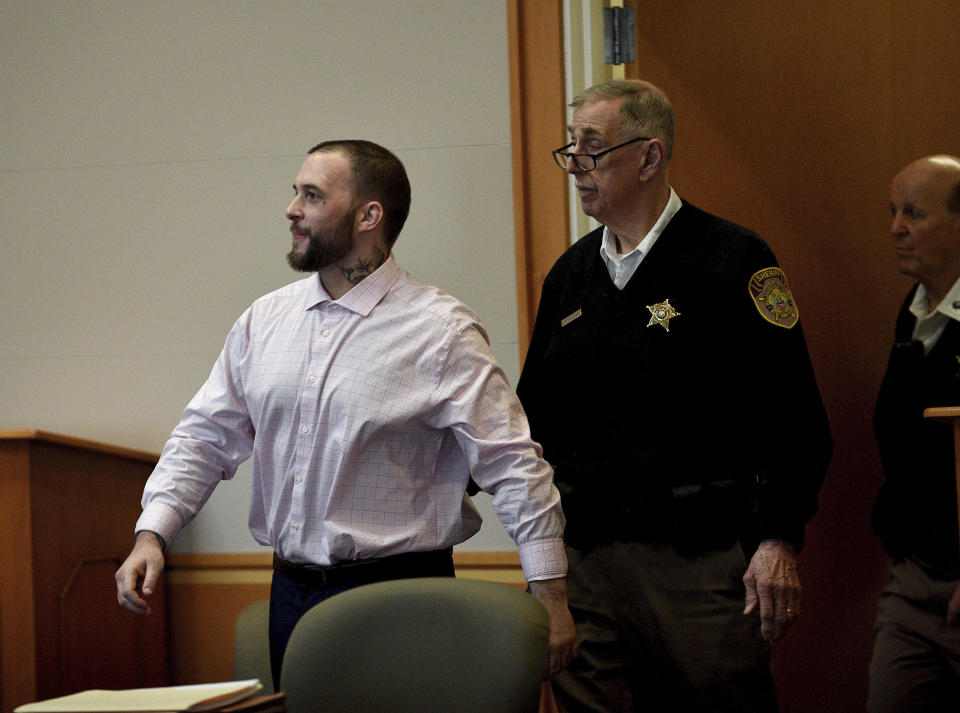 Adam Montgomery enters the courtroom for jury selection ahead of his murder trial at Hillsborough County Superior Court in Manchester, N.H, on Tuesday, Feb. 6, 2024. Montgomery is accused of killing his 5-year-old daughter and spending months moving her body before disposing of it. (David Lane/Union Leader via AP, Pool)