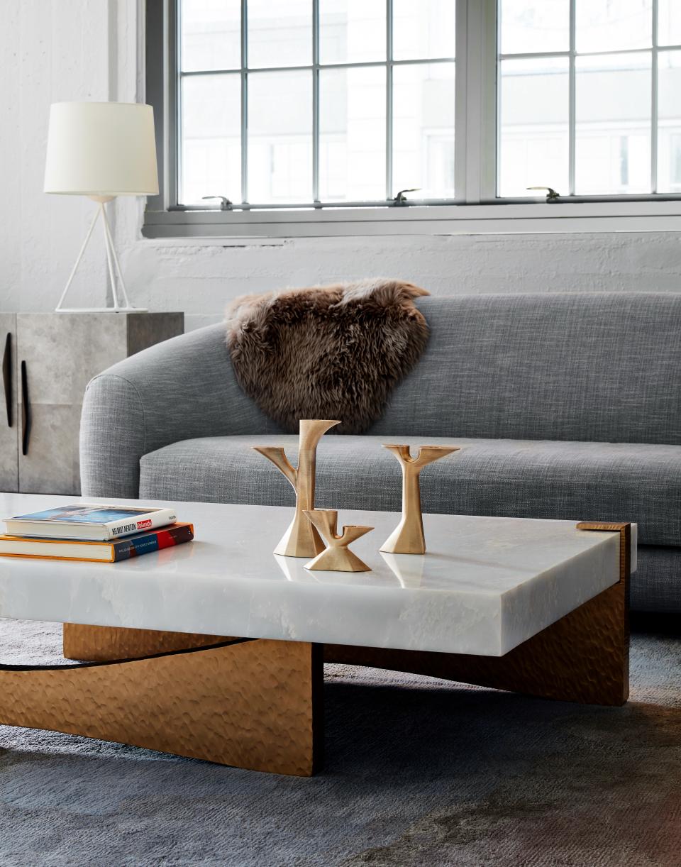 The white onyx Moore table, shown here, is one of the company's bestsellers. All of its pieces are made in a 60,000 square-foot factory in India.