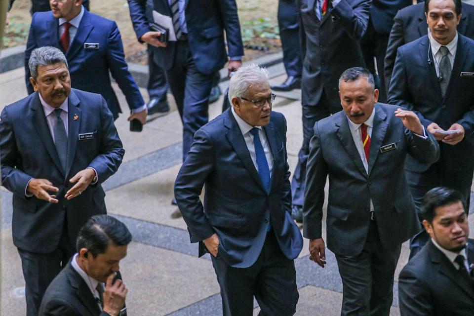 Home Minister Datuk Seri Hamzah Zainudin (centre) is pictured during a visit to the National Registration Department in Putrajaya July 20, 2020. — Picture by Hari Anggara