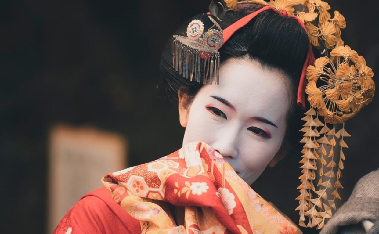 Asian woman dressed in traditional attire