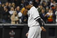 New York Yankees pitcher CC Sabathia is helped off the field during the eighth inning in Game 4 of baseball's American League Championship Series against the Houston Astros Thursday, Oct. 17, 2019, in New York. (AP Photo/Matt Slocum)