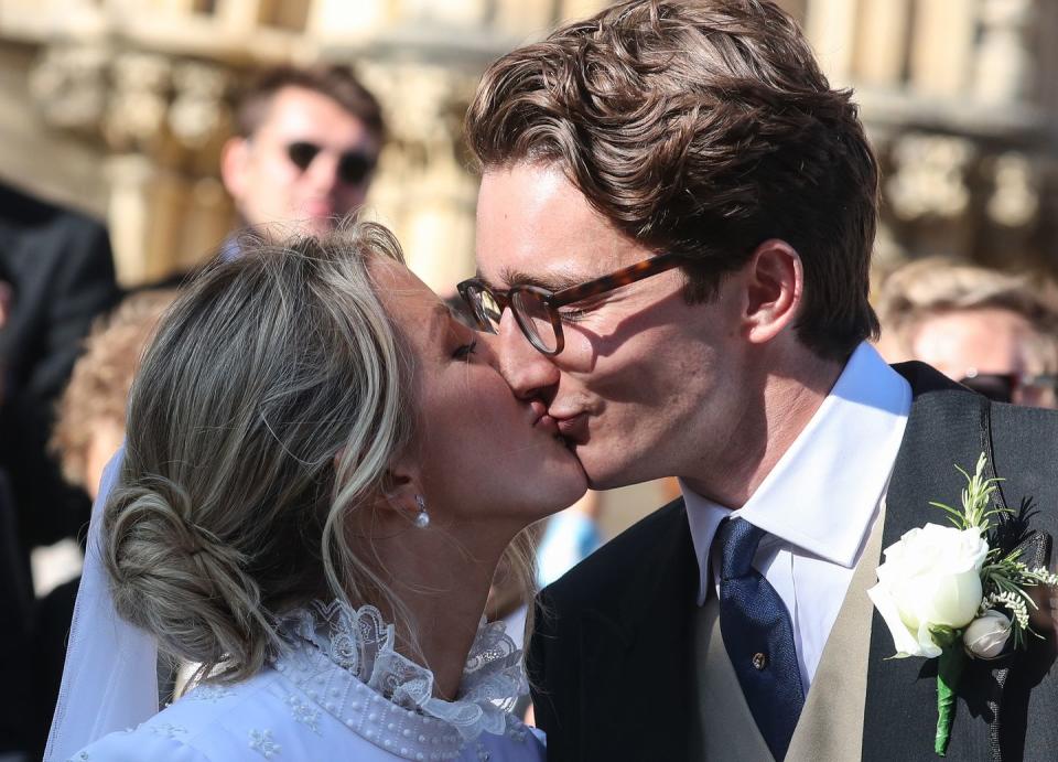 Ellie Goulding and Caspar Jopling kiss after their wedding at York Minster.