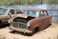 <p>It says 1959 on this British-built Ford Consul’s windshield, but these Mk1 cars were only made between 1951 and 1956. In total <strong>227,732</strong> were built, with a decent number heading to the US. The car was frugal by US standards, but the downside to its 1.5-<span>litre </span>engine, was the 28sec it took to reach 60mph. This car is also at <strong>Desert Valley Auto Parts</strong>.</p>