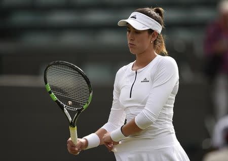 Britain Tennis - Wimbledon - All England Lawn Tennis & Croquet Club, Wimbledon, England - 30/6/16 Spain's Garbine Muguruza reacts against Slovakia's Jana Cepelova REUTERS/Tony O'Brien