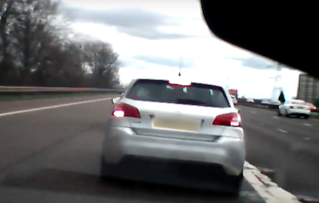 The men carried out a "crash for cash" scam on a motorway slip road (Picture: City of London Police)