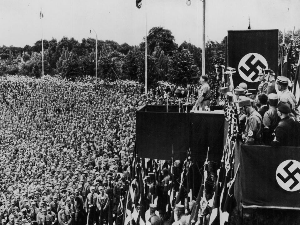 German dictator Adolf Hitler speaking to a crowd at a Nazi rally, in Dortmund, in 1933.