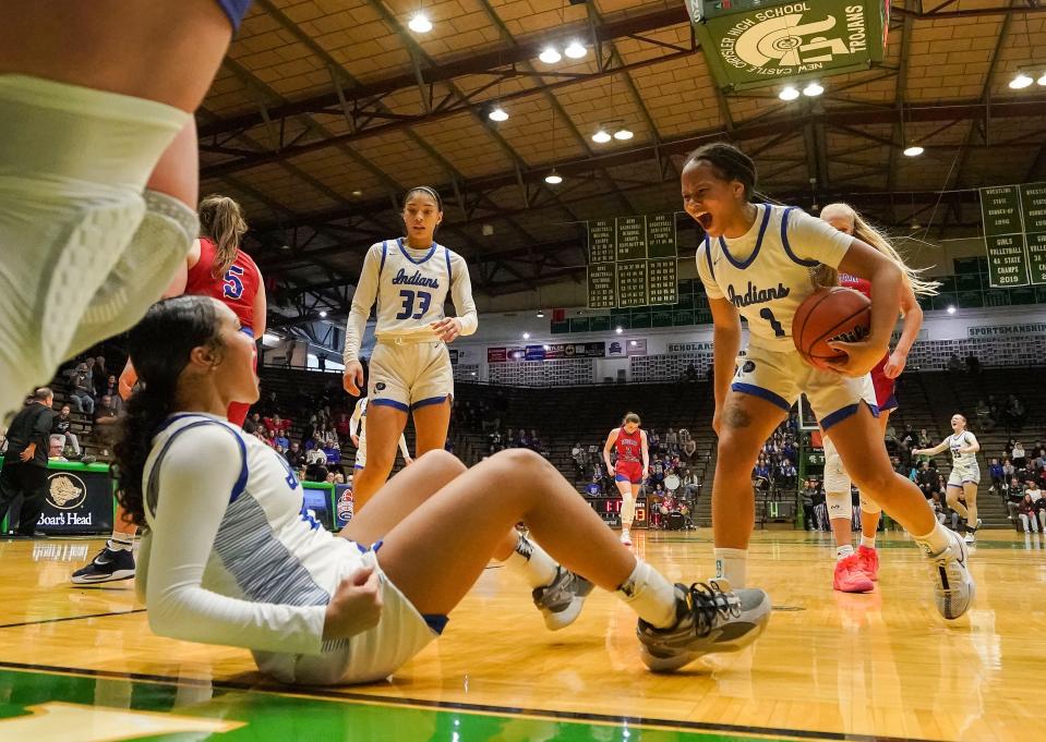 Lake Central's guard Kennedie Burks (1) yells in excitement with Lake Central's guard Vanessa Wimberly (23) on Thursday, Oct. 5, 2023, during the Hall of Fame Classic girls basketball tournament at New Castle Fieldhouse in New Castle. Lake Central defeated Indian Creek, 51-45.