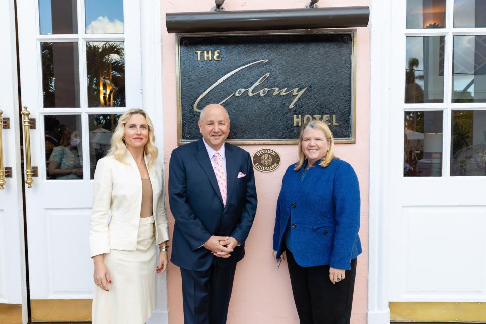 The Colony Hotel co-owner and CEO Sarah Wetenhall, left; General Manager Bruce Seigel; and Mayor Danielle Moore (from left) took part in a plaque dedication ceremony in February to mark the hotel's designation as an historic landmark.