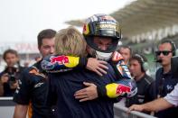 KUALA LUMPUR, MALAYSIA - OCTOBER 21: Sandro Cortese of Germany and Red Bull KTM Ajo celebrates with mechanics after winning the Moto3 race, sealing victory in the Moto3 Championship, during the MotoGP Of Malaysia at Sepang Circuit on October 21, 2012 in Kuala Lumpur, Malaysia. (Photo by Mirco Lazzari gp/Getty Images)