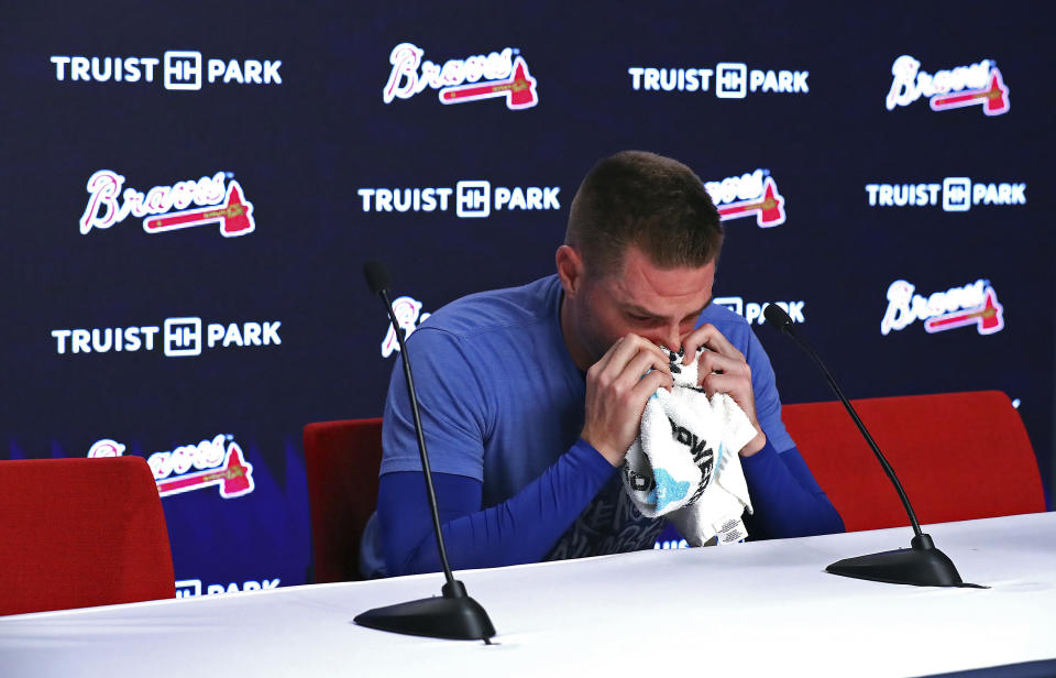 Los Angeles Dodgers' Freddie Freeman, formerly of the Atlanta Braves, becomes emotional during a pregame baseball news conference before taking on his former team, Friday, June 24, 2022, in Atlanta. (Curtis Compton/Atlanta Journal-Constitution via AP)