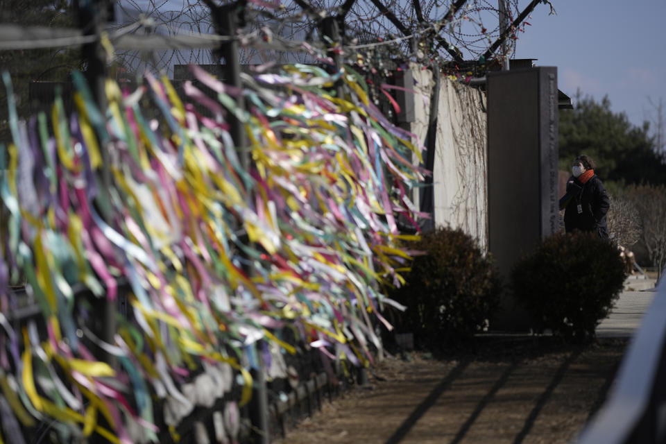 The ribbons with messages wishing for peace between the two Koreas are hanged on the wire fences at the Imjingak Pavilion in Paju, South Korea, Sunday, Feb. 19, 2023. North Korea said Sunday its latest intercontinental ballistic missile test was meant to further bolster its “fatal” nuclear attack capacity against its rivals, as it threatened additional powerful steps in response to the planned military training between the United States and South Korea. (AP Photo/Lee Jin-man)