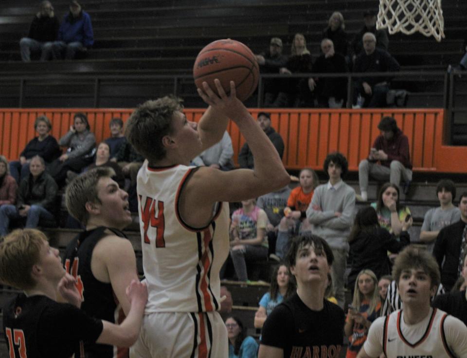 Cheboygan freshman Nolan Schley (44) puts up a shot during the second half against Harbor Springs on Monday.