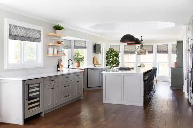<p>MOLLY CULVER</p> This roomy kitchen is decorated with a minimalist edge, as was popular in the 2010s.