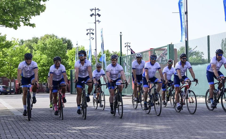 The Peloton of core riders arrive at Twickenham Stadium as they come to the finish of the Road to Twickenham Cycle Ride in association with Gallagher