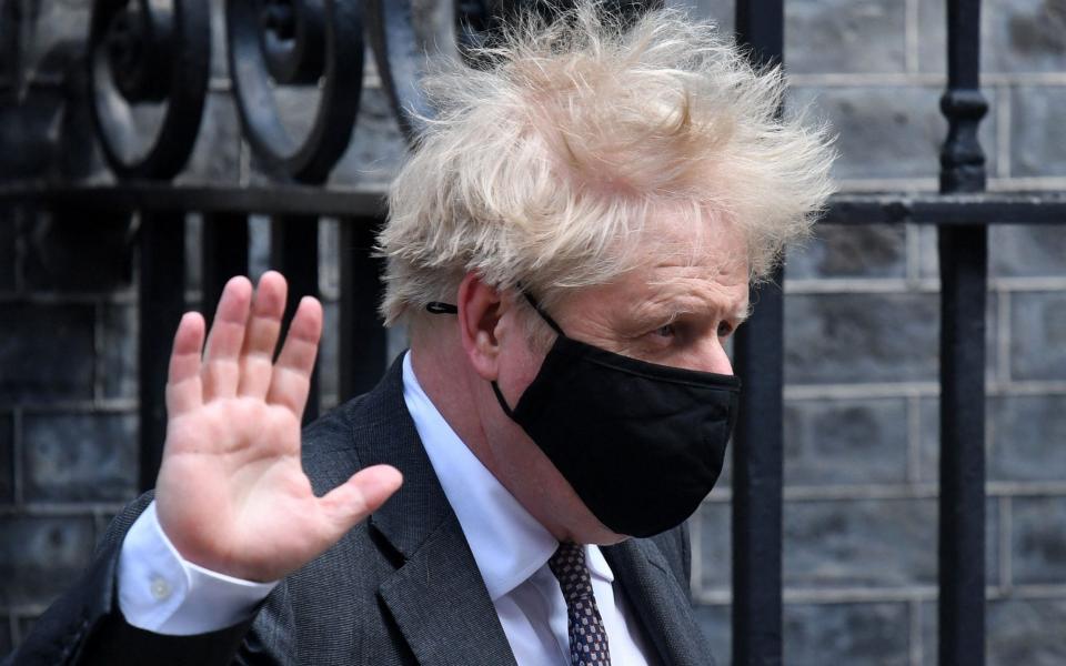 Boris Johnson leaves 10 Downing Street this morning - AFP