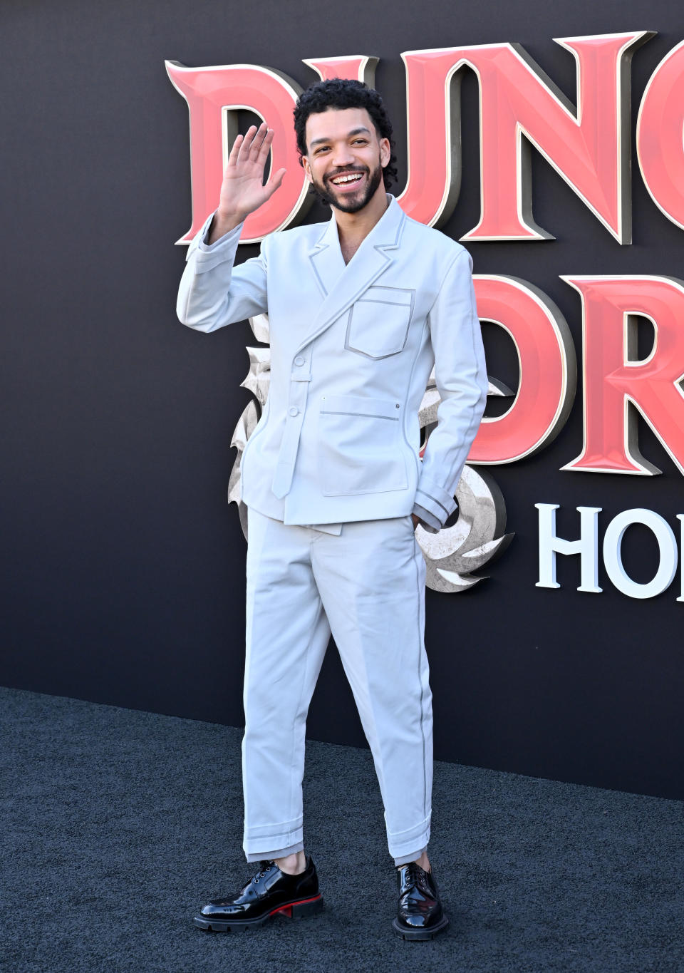 LOS ANGELES, CALIFORNIA - MARCH 26: Justice Smith attends the Los Angeles Premiere of Paramount Pictures' 