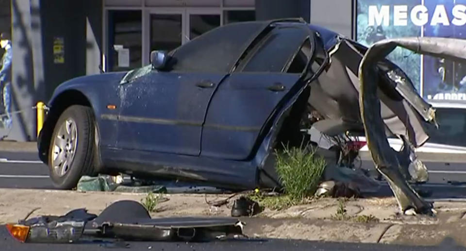 A car split in three and its driver killed after a horrific crash on the Nepean Highway, Cheltenham, south of Melbourne. Source: 7 News