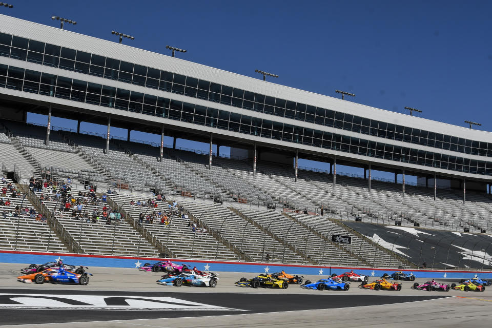 Racers vie for position at the beginning of the NTT IndyCar Series XPEL 375 at Texas Motor Speedway in Fort Worth, Texas, on Sunday, March 20, 2022. (AP Photo/Randy Holt)