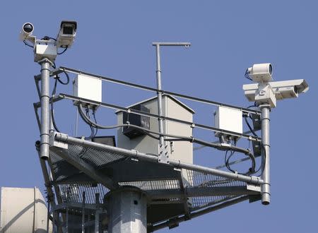 A Border Patrol camera tower aimed at Mexico is seen near Laredo, Texas May 1, 2006. REUTERS/Rick Wilking/File photo