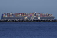 This Tuesday, Oct. 19, 2021, photo shows the MSC DANIT anchored outside the Port of Los Angeles. Federal investigators have said they believe a 1,200-foot (366-meter) cargo ship dragging anchor in rough seas caught the pipeline operated by Houston-based Amplify Energy and pulled it across the seafloor early this year. They have not determined whether impact with the Panama-registered MSC DANIT caused this spill or if the line was hit by something else or failed due to a preexisting problem. (AP Photo/Damian Dovarganes)